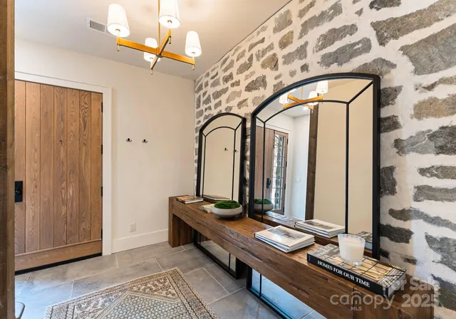 a view of a hallway with couch