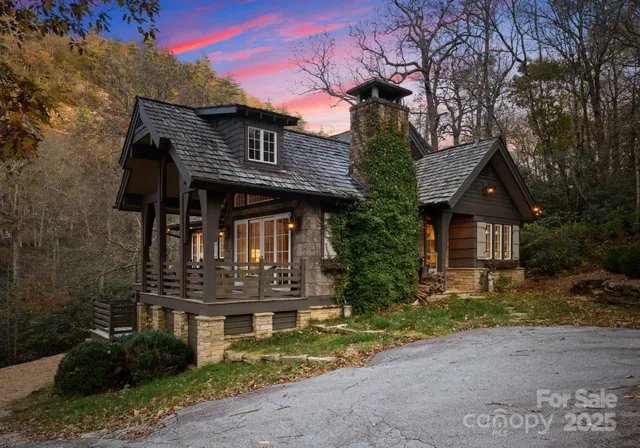 a view of a town with mountains in the background