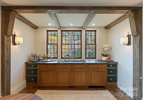 a kitchen with a sink and cabinets