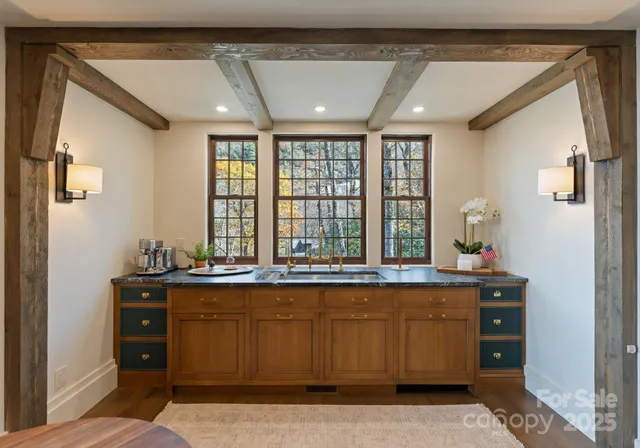a kitchen with a sink and cabinets