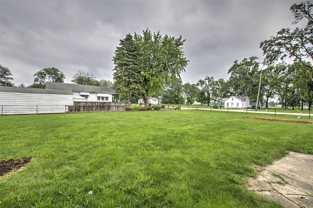 4402 East Rosewood Drive Decatur, IL 62521 - Photo 22 of 23 a view of outdoor space with deck and yard