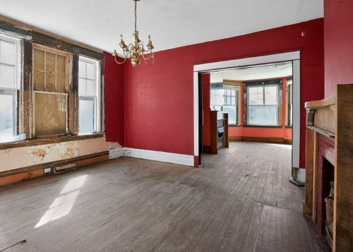 1156 Pemberton Street Pittsburgh, PA 15212 - Photo 14 of 20 a view of empty room with wooden floor and fan