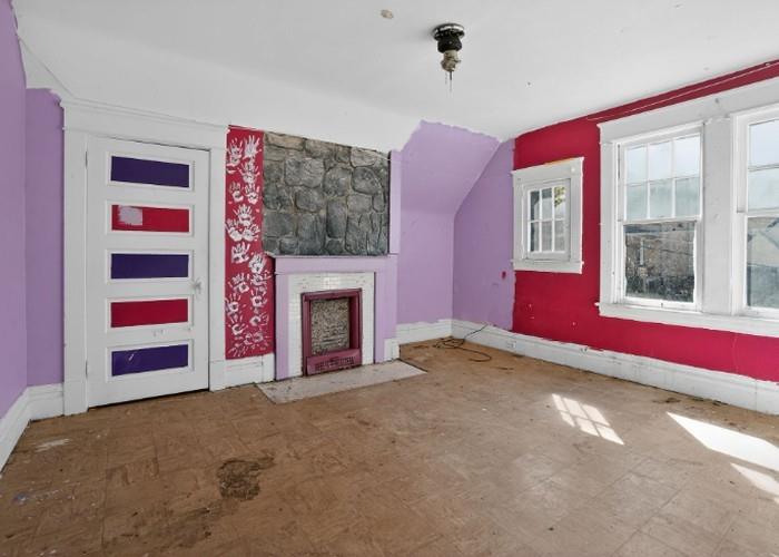 1156 Pemberton Street Pittsburgh, PA 15212 - Photo 16 of 20 a view of empty room with window and fireplace