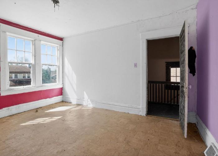1156 Pemberton Street Pittsburgh, PA 15212 - Photo 17 of 20 a view of an empty room with a window