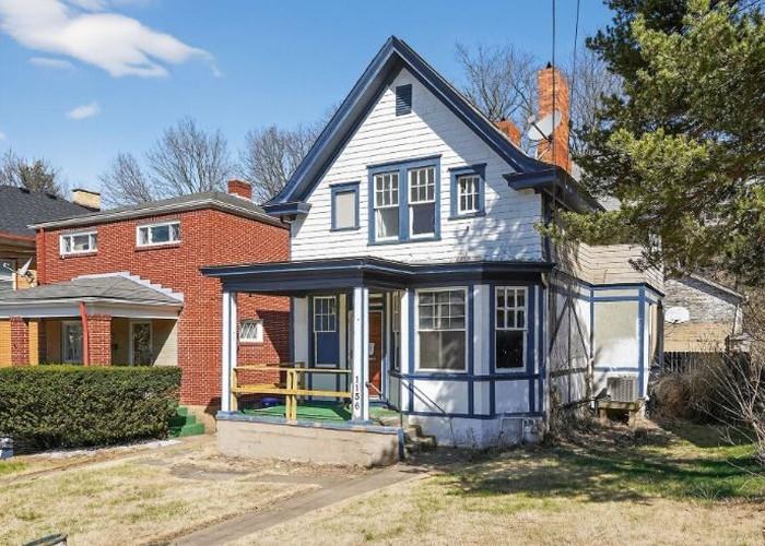1156 Pemberton Street Pittsburgh, PA 15212 - Photo 2 of 20 a view of a white house with large windows next to a yard