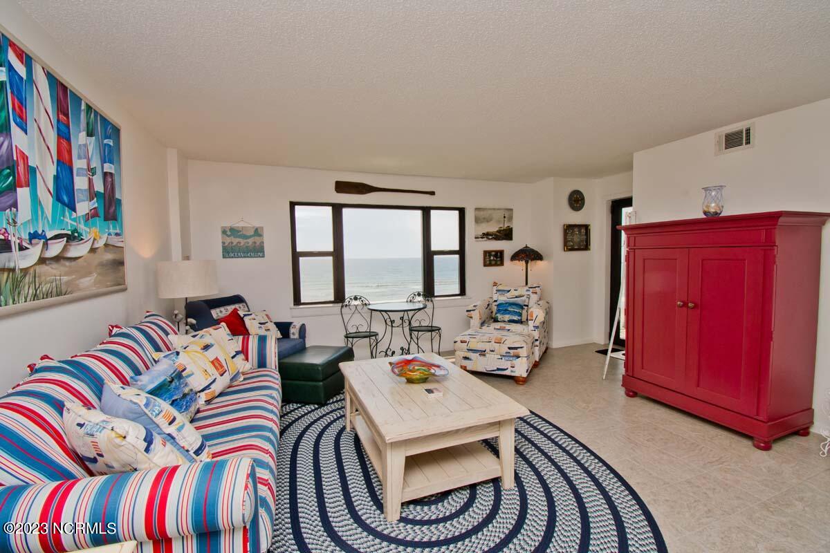 1505 Salter Path Road, Unit 404 Indian Beach, NC 28512 - Photo 10 of 48 living room with ocean view