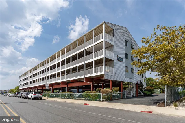 a front view of a building with street view