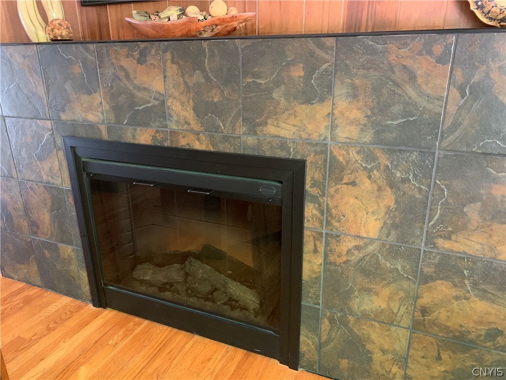 206 Deforest Road Syracuse, NY 13214 - Photo 11 of 49 Close up of the electric fireplace in the living r
