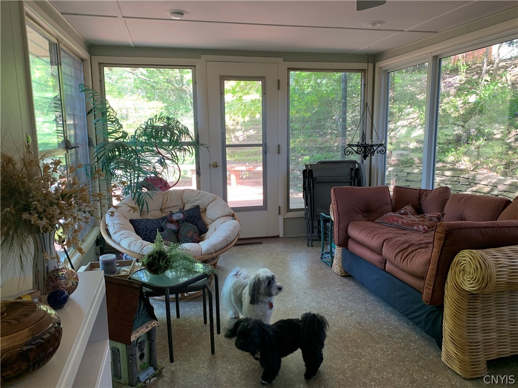 206 Deforest Road Syracuse, NY 13214 - Photo 13 of 49 Florida sunroom off the dining room with picture w