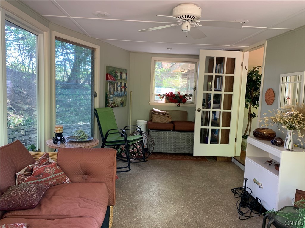206 Deforest Road Syracuse, NY 13214 - Photo 14 of 49 Another view of the Florida room as it enters the