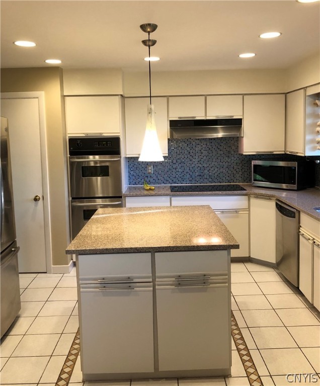 206 Deforest Road Syracuse, NY 13214 - Photo 15 of 49 Kitchen with center island and double wall oven