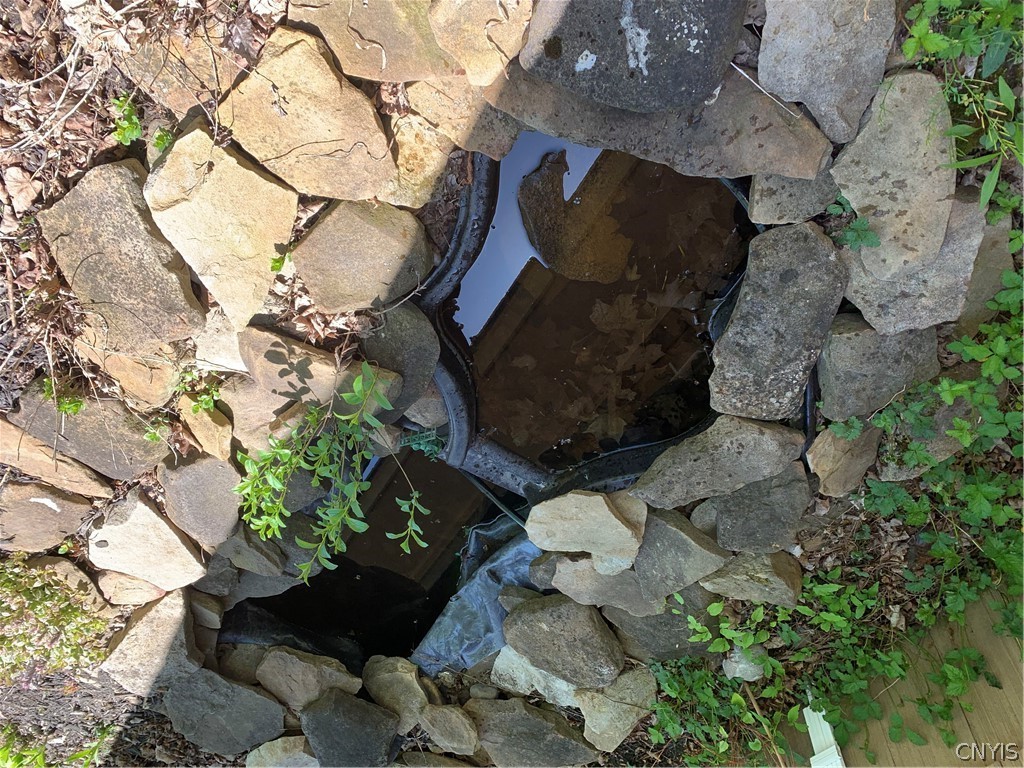 206 Deforest Road Syracuse, NY 13214 - Photo 41 of 49 Small decorative pond on the upper patio