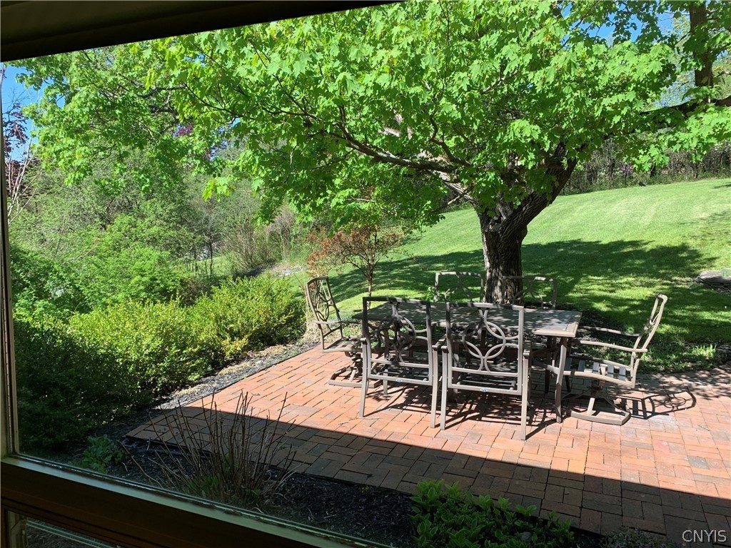 206 Deforest Road Syracuse, NY 13214 - Photo 44 of 49 Upper patio ( table and chairs will stay if buyer