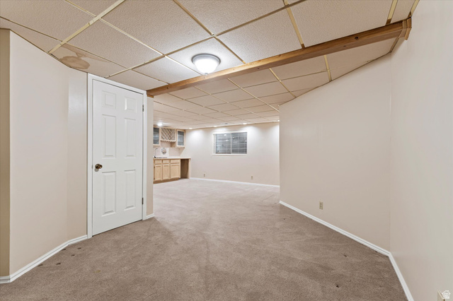 888 East 6895 South Midvale, UT 84047 - Photo 33 of 54 Flexible lower-level space with ample room for seating, hobbies, or guest accommodations.