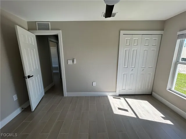 an empty room with windows