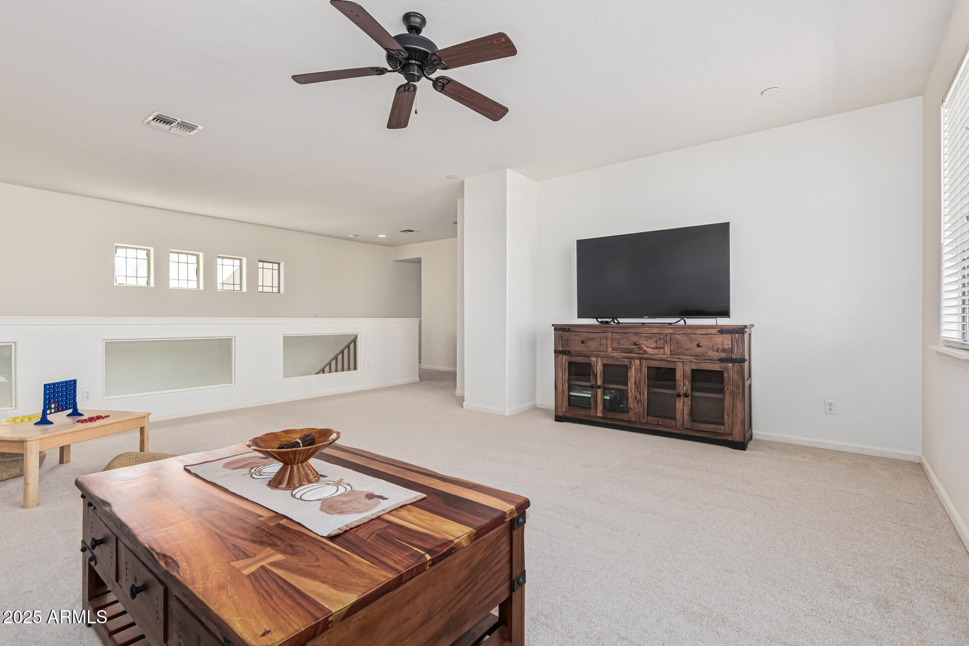 246 East Frances Lane Gilbert, AZ 85295 - Photo 15 of 25 a living room with furniture and a flat screen tv