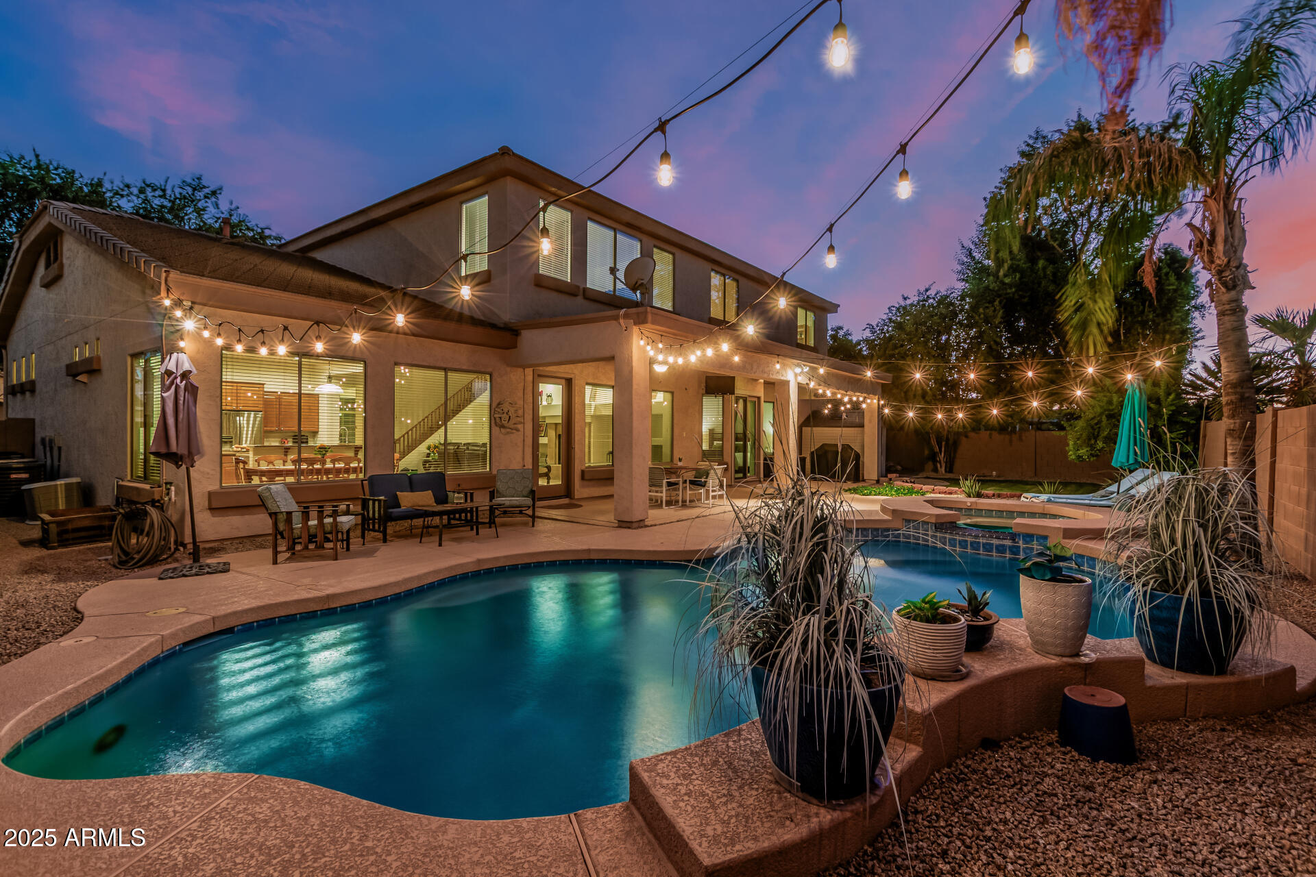 246 East Frances Lane Gilbert, AZ 85295 - Photo 3 of 25 a view of a swimming pool with a patio