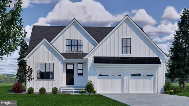 a view of house with yard