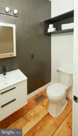 a bathroom with a sink and a toilet