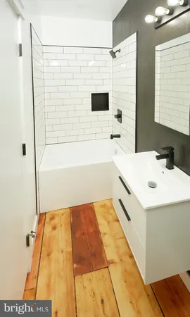 a bathroom with a sink and a bathtub