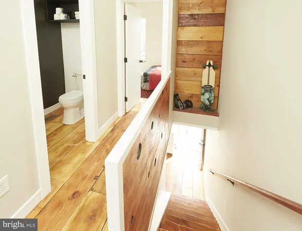 a bathroom with a bathtub and a toilet