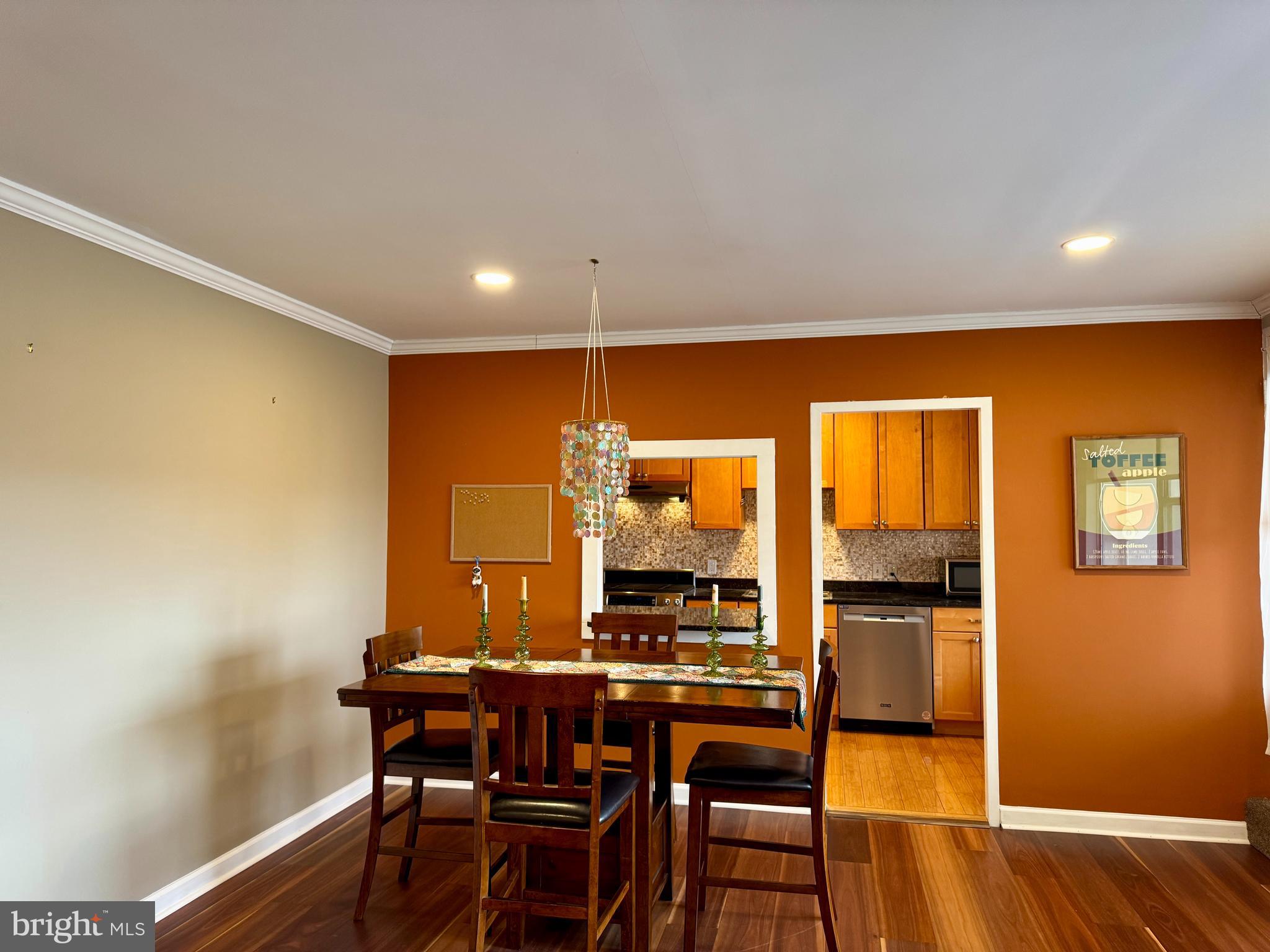 7900 Old York Road, Unit 814A Elkins Park, PA 19027 - Photo 15 of 43 a view of a dining room with furniture window and wooden floor
