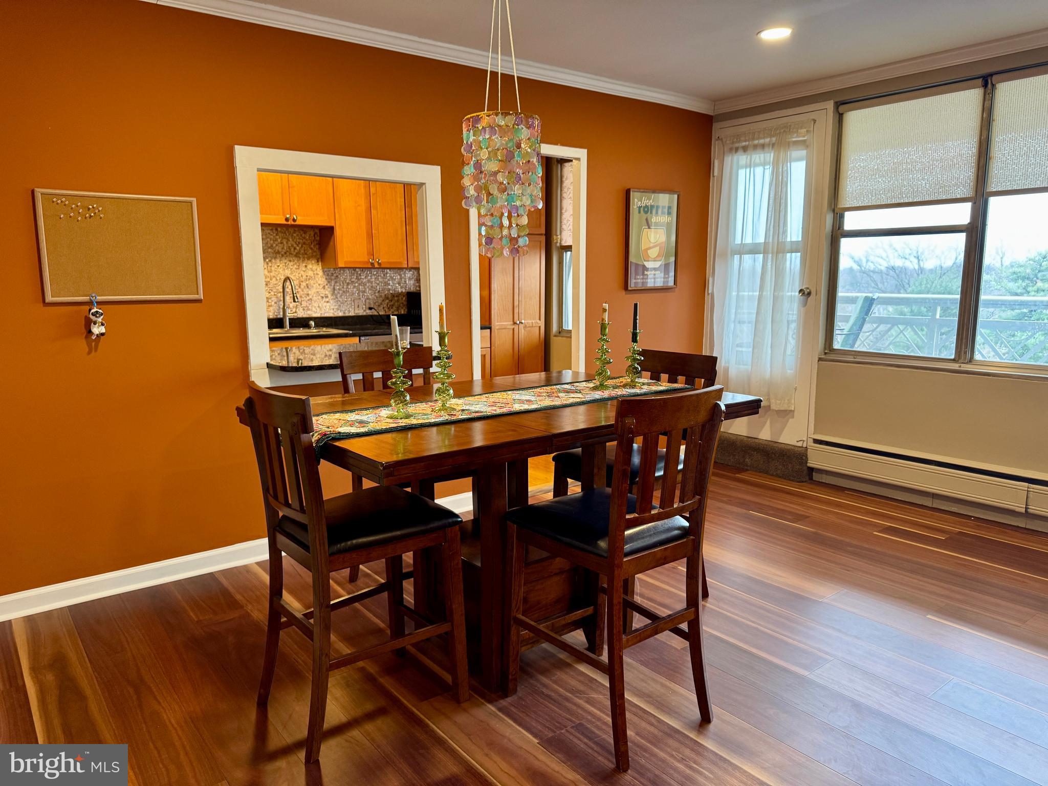 7900 Old York Road, Unit 814A Elkins Park, PA 19027 - Photo 22 of 43 a dining room with furniture window wooden floor