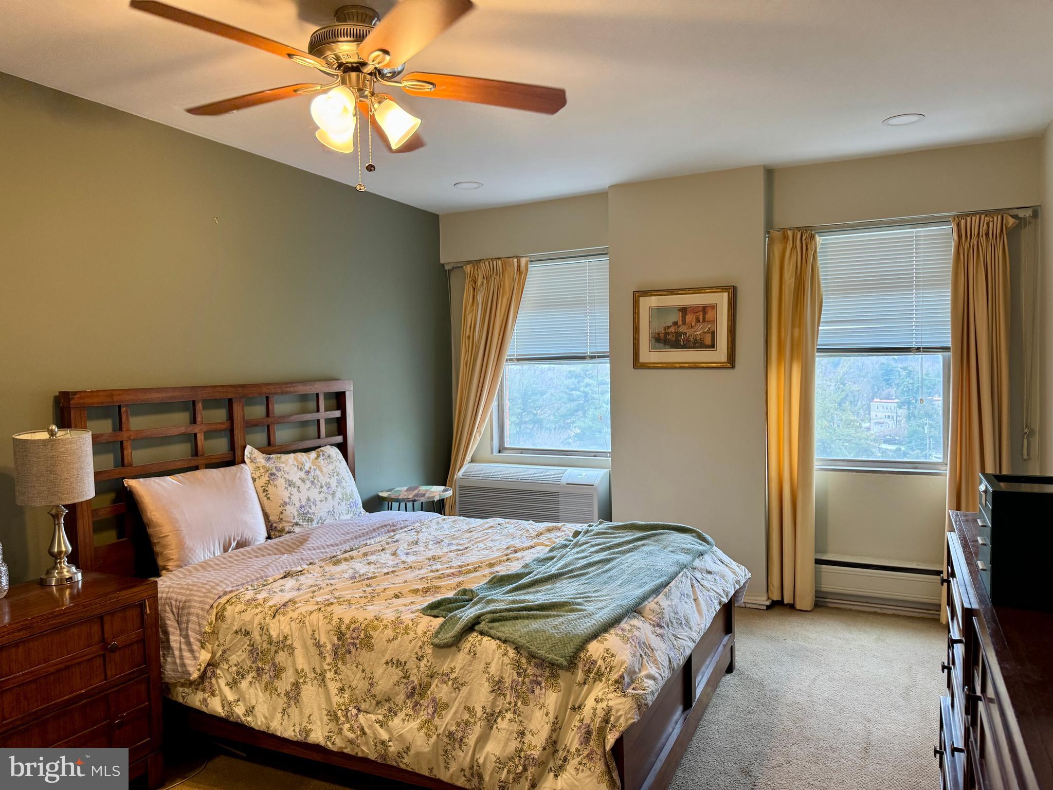 7900 Old York Road, Unit 814A Elkins Park, PA 19027 - Photo 31 of 43 a bedroom with a bed and a window