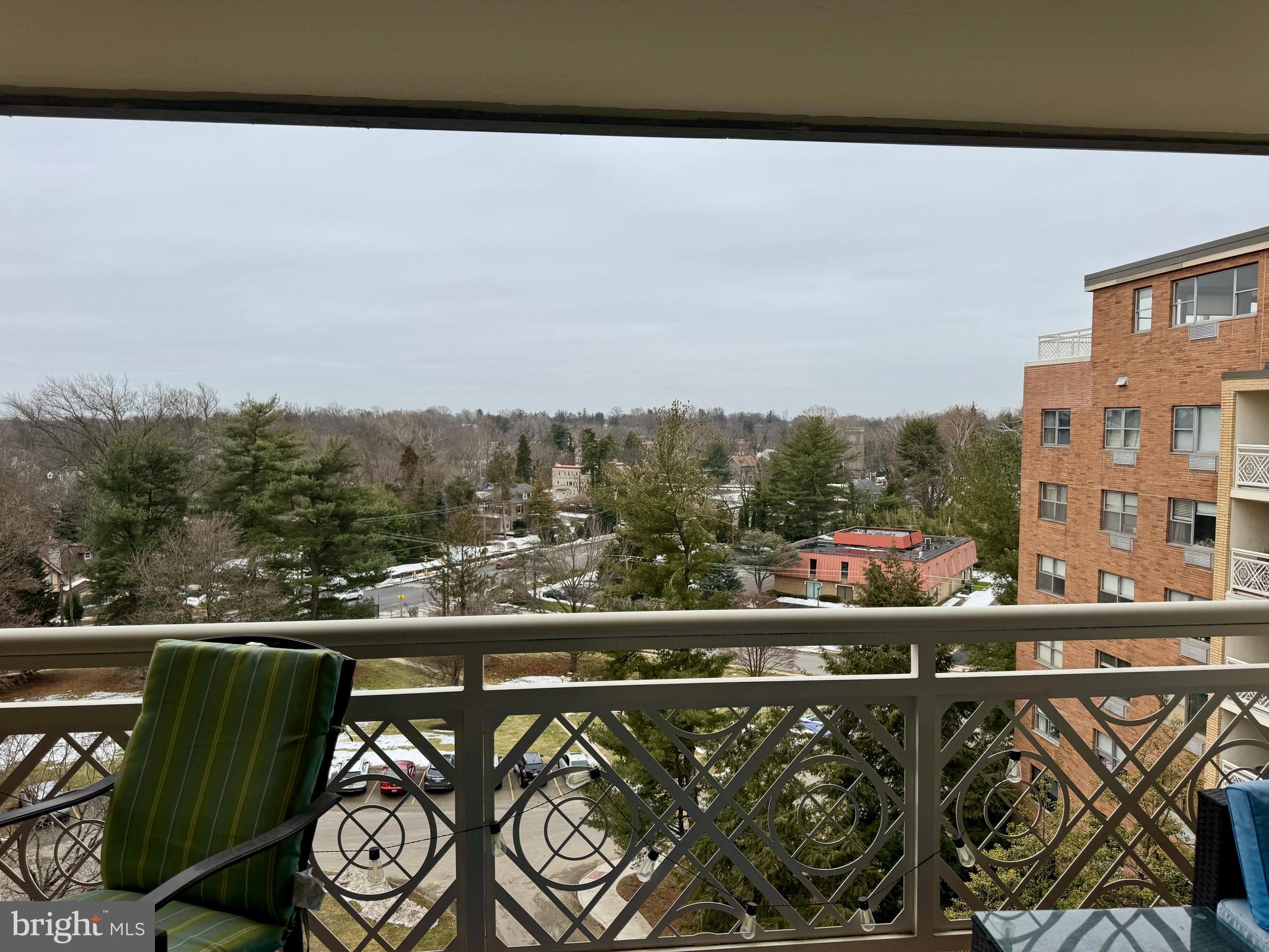 7900 Old York Road, Unit 814A Elkins Park, PA 19027 - Photo 34 of 43 a view of a balcony with wooden benches