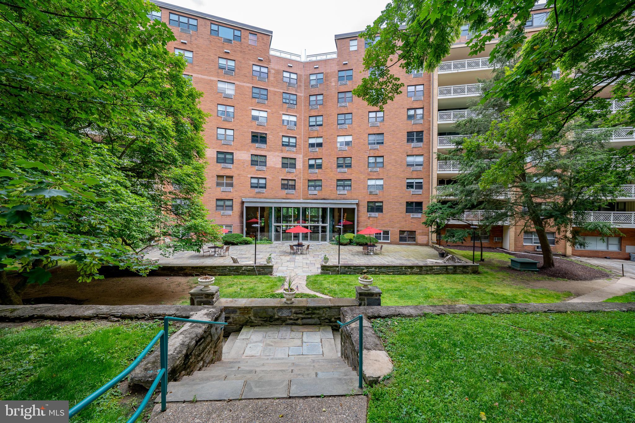 7900 Old York Road, Unit 814A Elkins Park, PA 19027 - Photo 36 of 43 a front view of a building with garden