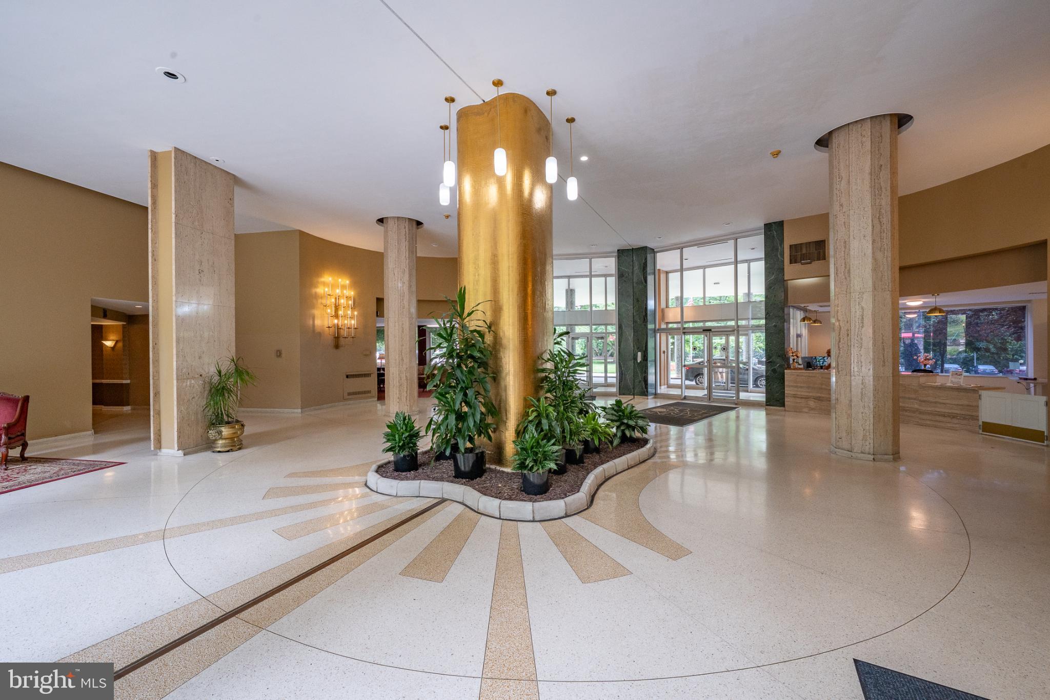 7900 Old York Road, Unit 814A Elkins Park, PA 19027 - Photo 5 of 43 a lobby with furniture and floor to ceiling window