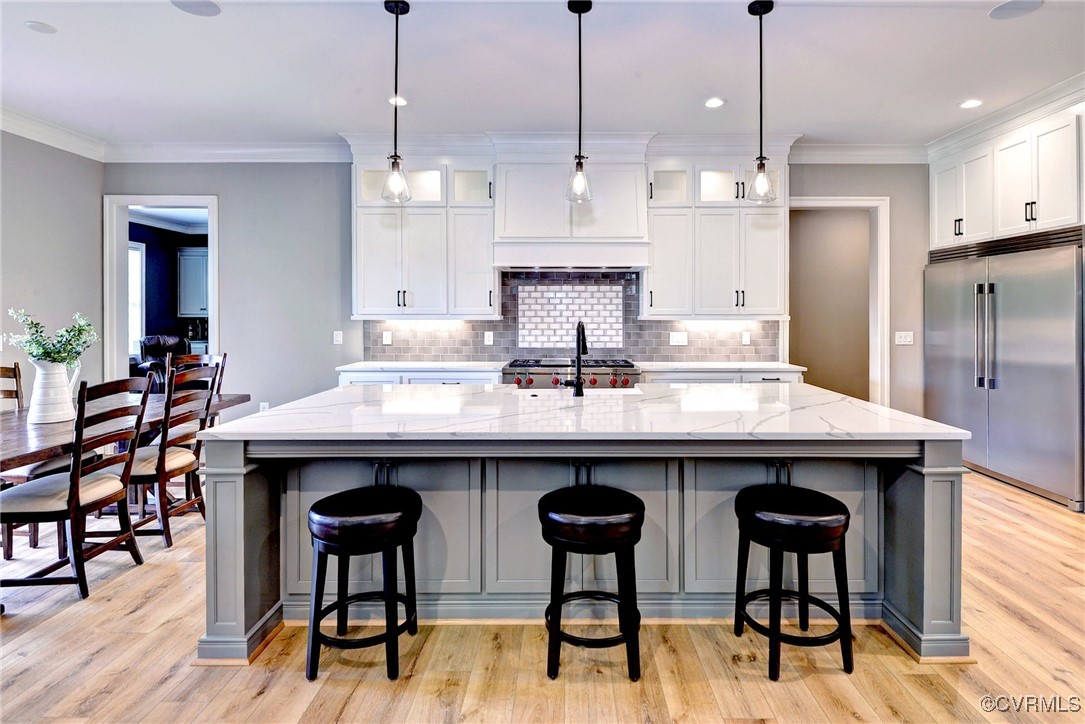 116 Formby Williamsburg, VA 23188 - Photo 15 of 50 a kitchen with stainless steel appliances kitchen island a table and chairs in it