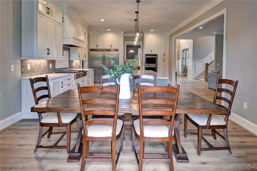 116 Formby Williamsburg, VA 23188 - Photo 20 of 50 a dining room with furniture and wooden floor
