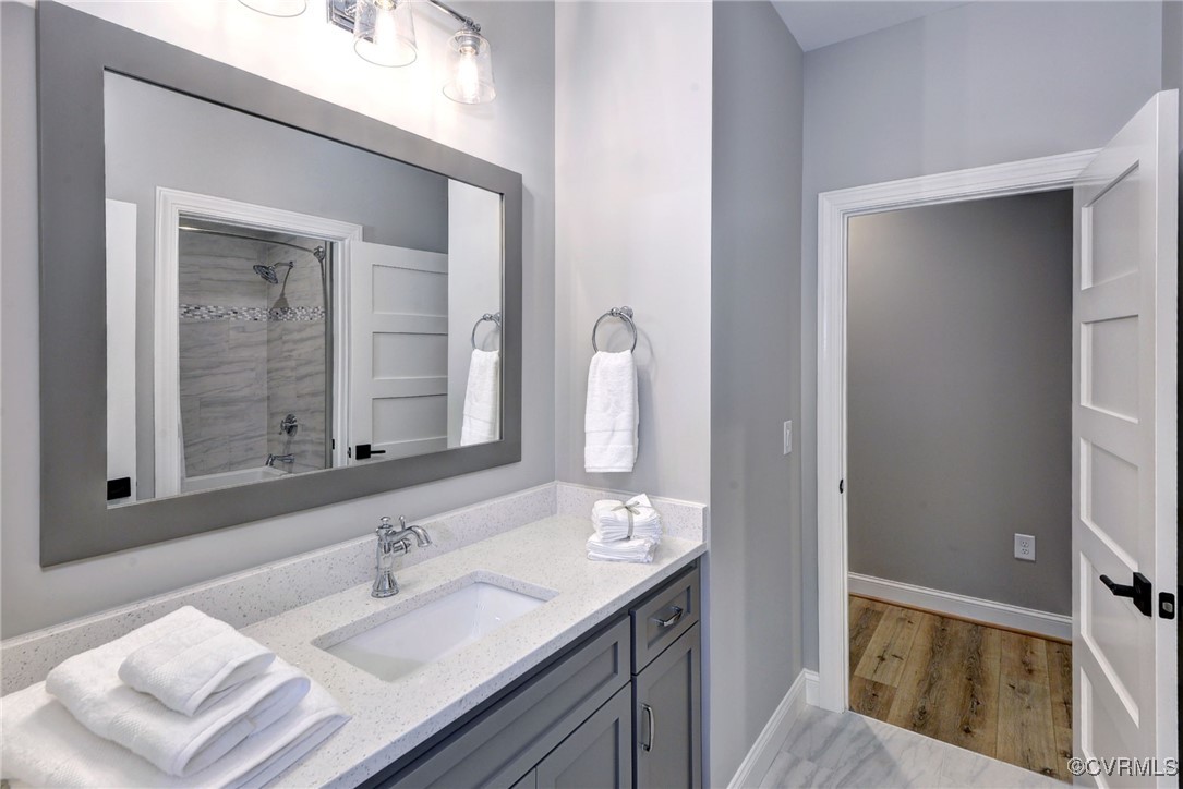 116 Formby Williamsburg, VA 23188 - Photo 34 of 50 a bathroom with a sink and a mirror