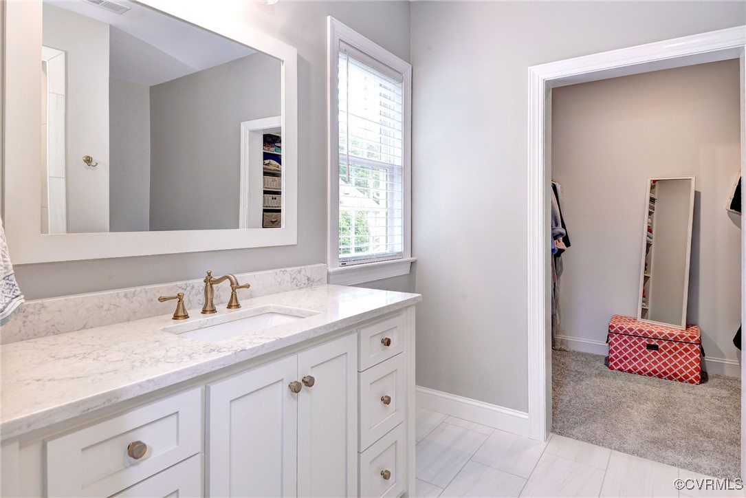 116 Formby Williamsburg, VA 23188 - Photo 36 of 50 a bathroom with a granite countertop sink and a mirror