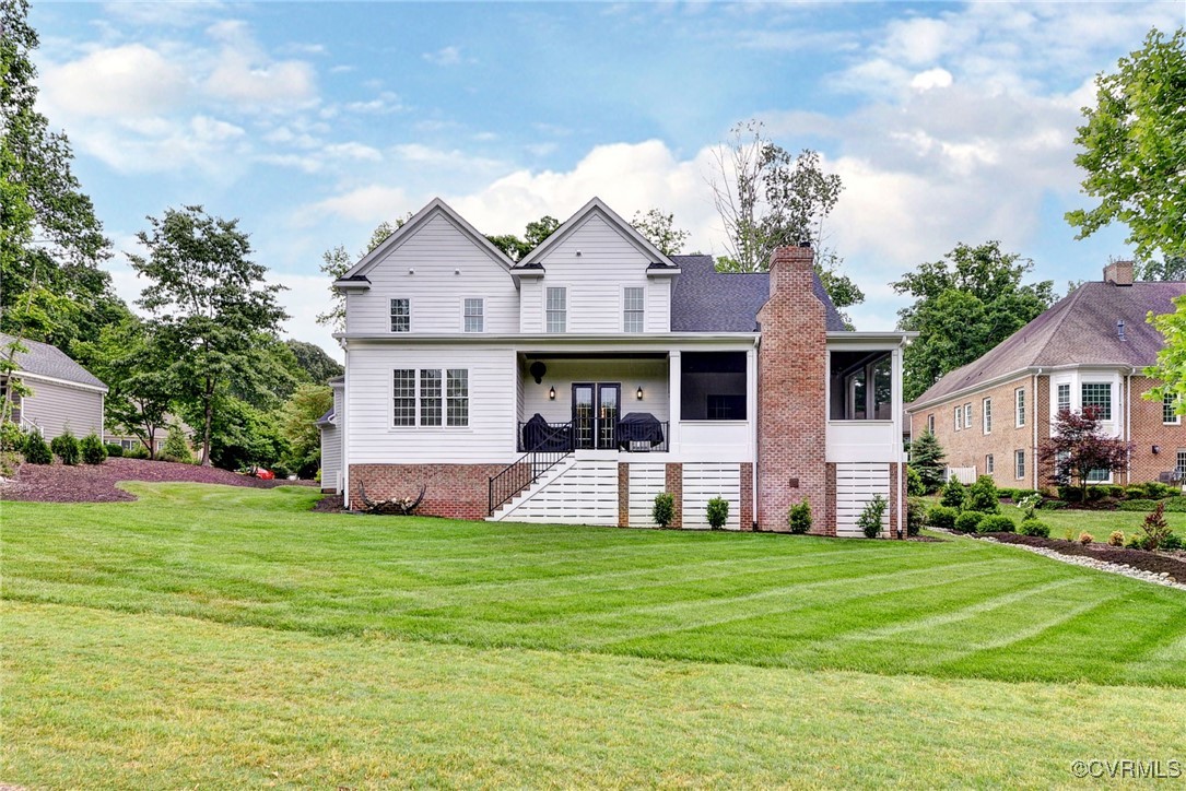 116 Formby Williamsburg, VA 23188 - Photo 41 of 50 a front view of a house with a garden and trees
