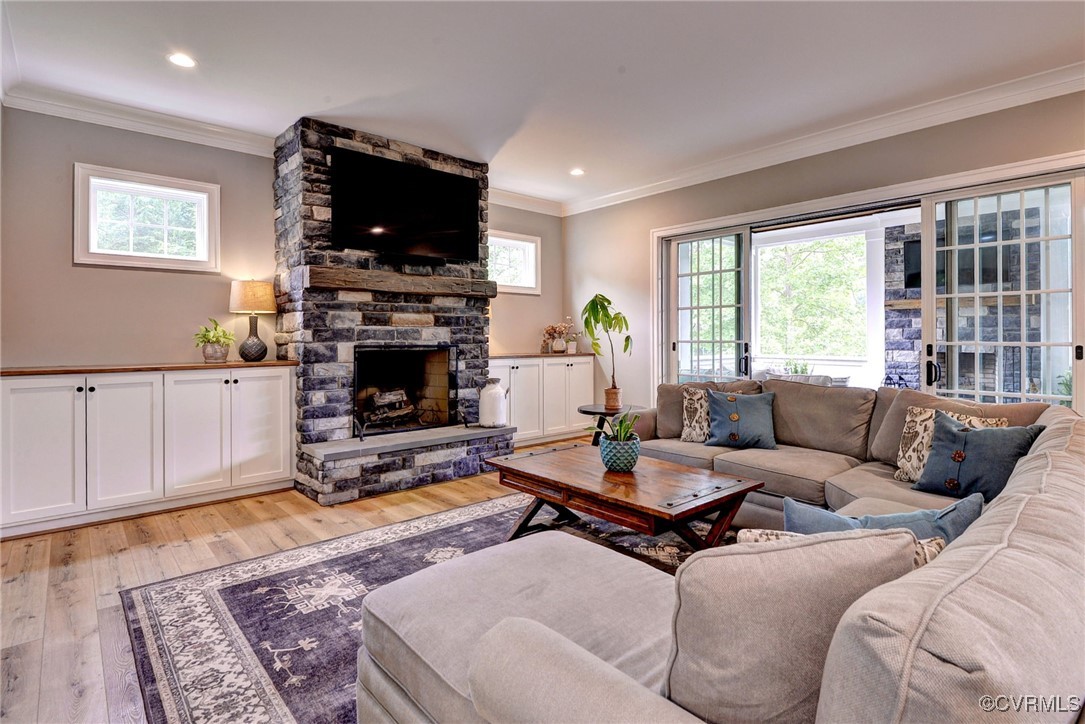 116 Formby Williamsburg, VA 23188 - Photo 9 of 50 a living room with furniture a fireplace and a flat screen tv