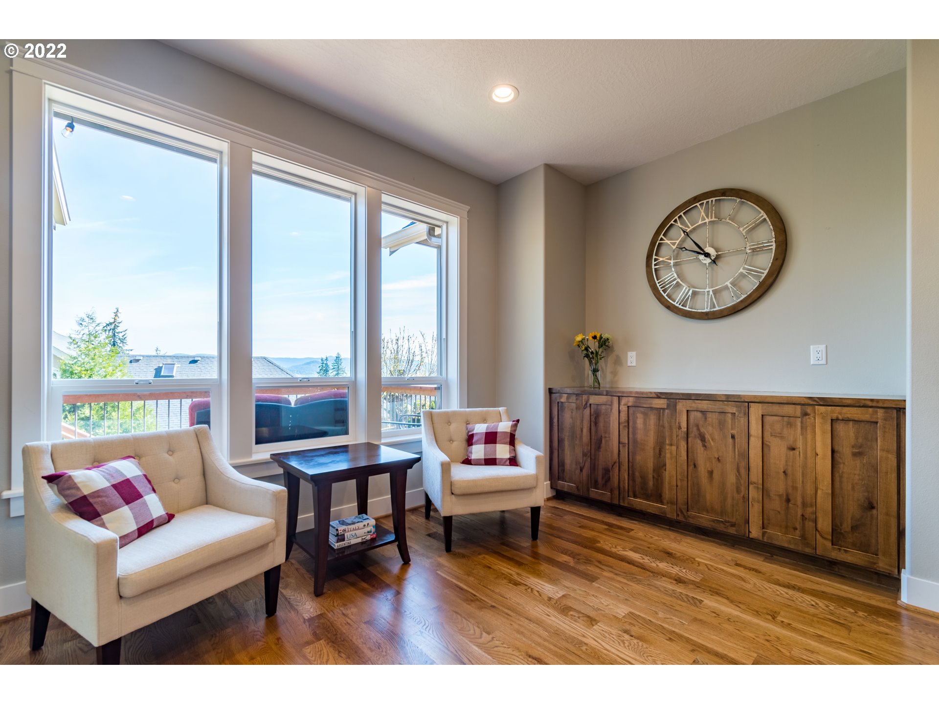 6074 Graystone Loop Springfield, OR 97478 - Photo 14 of 32 a living room with furniture a table and a large window