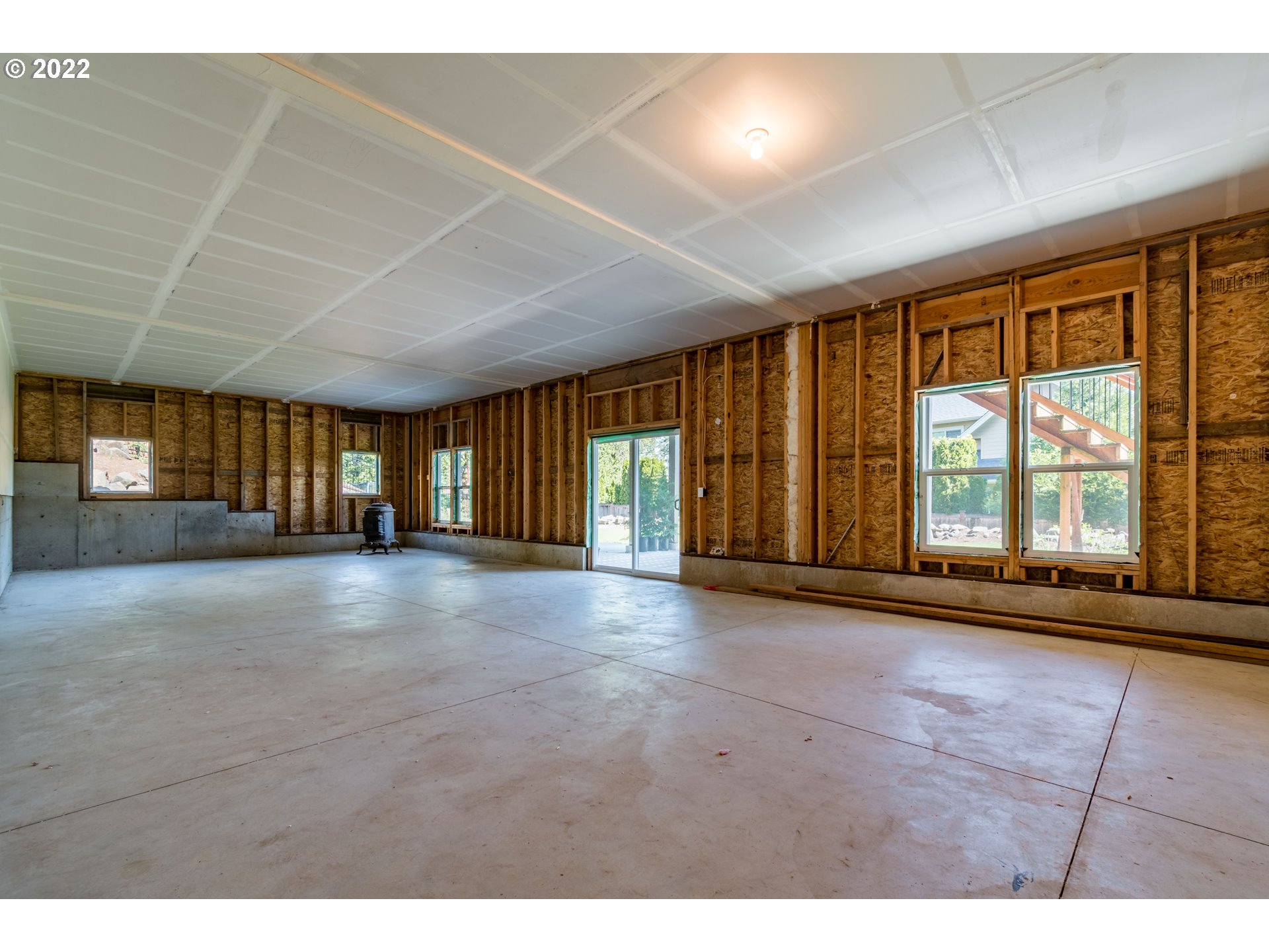 6074 Graystone Loop Springfield, OR 97478 - Photo 26 of 32 a view of an empty room with a window
