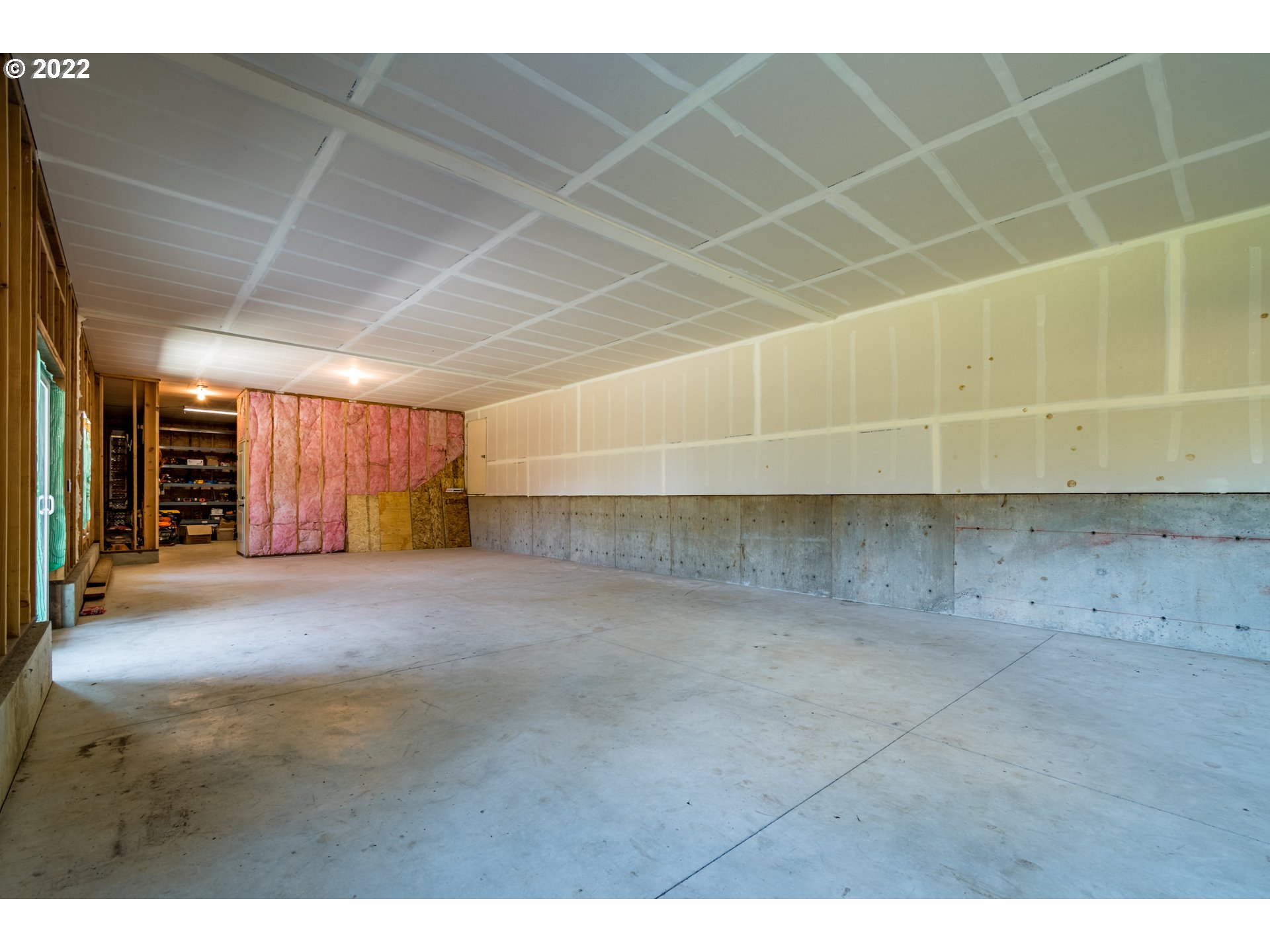 6074 Graystone Loop Springfield, OR 97478 - Photo 27 of 32 a view of a room with stairs and a window
