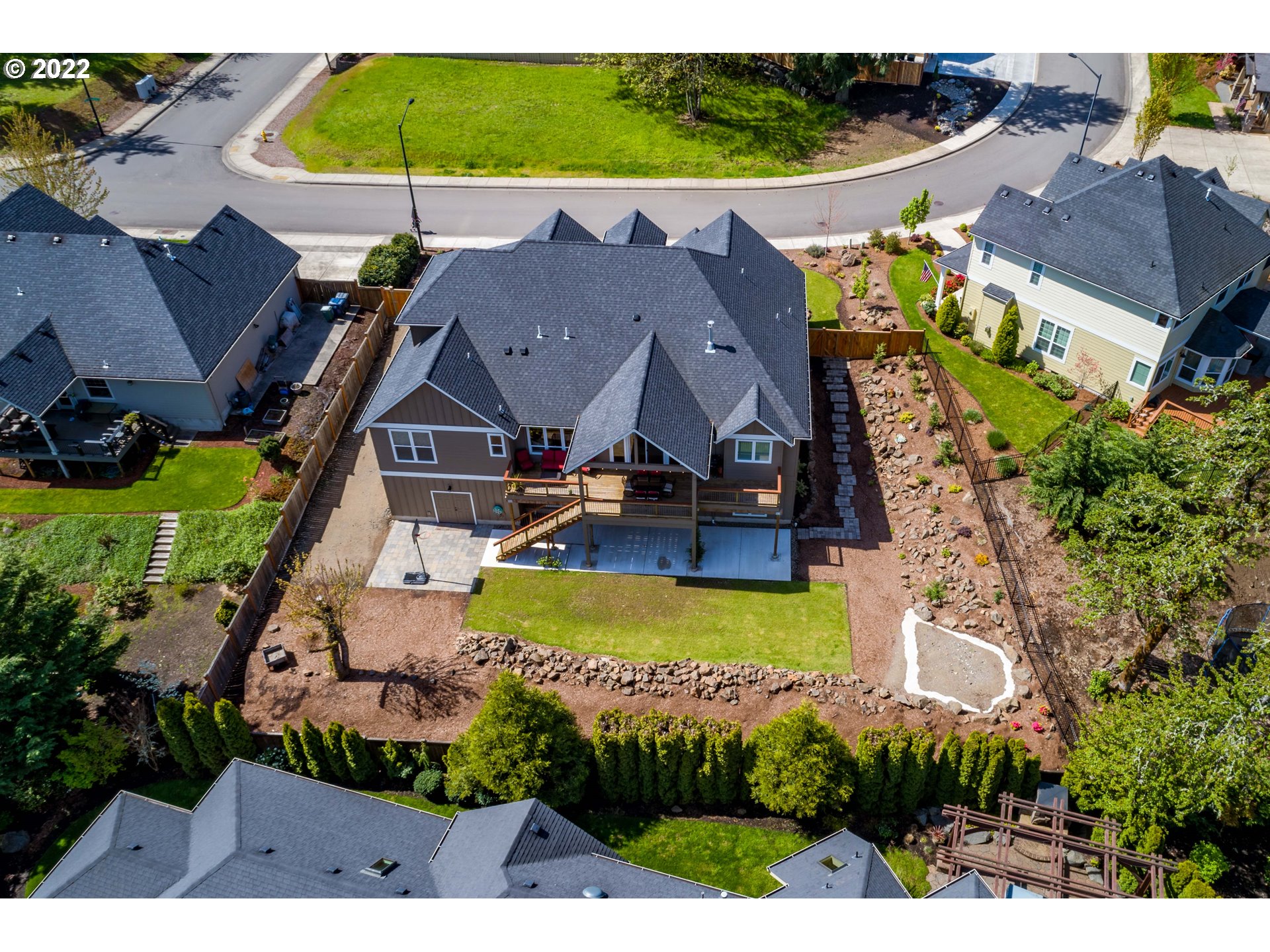 6074 Graystone Loop Springfield, OR 97478 - Photo 32 of 32 an aerial view of a house with a swimming pool