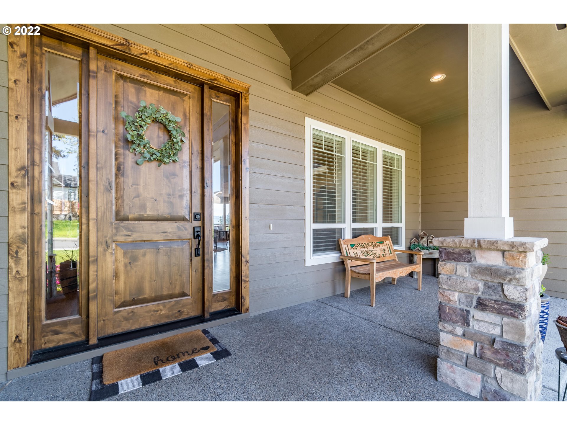 6074 Graystone Loop Springfield, OR 97478 - Photo 5 of 32 a living room with furniture and large windows
