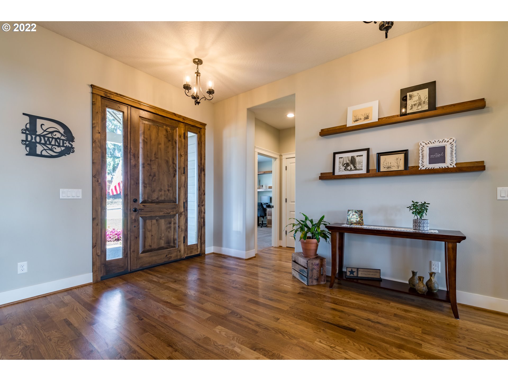 6074 Graystone Loop Springfield, OR 97478 - Photo 6 of 32 a view of livingroom with furniture and wooden floor