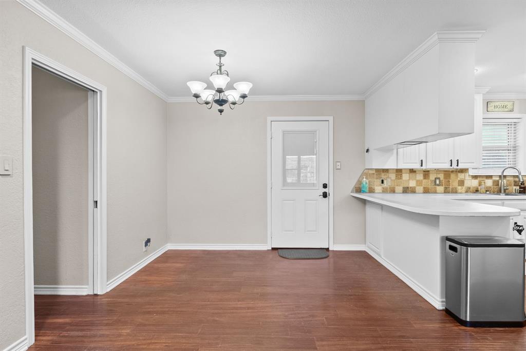3217 Libbie Street Tyler, TX 75707 - Photo 12 of 35 a spacious bathroom with a sink and a mirror