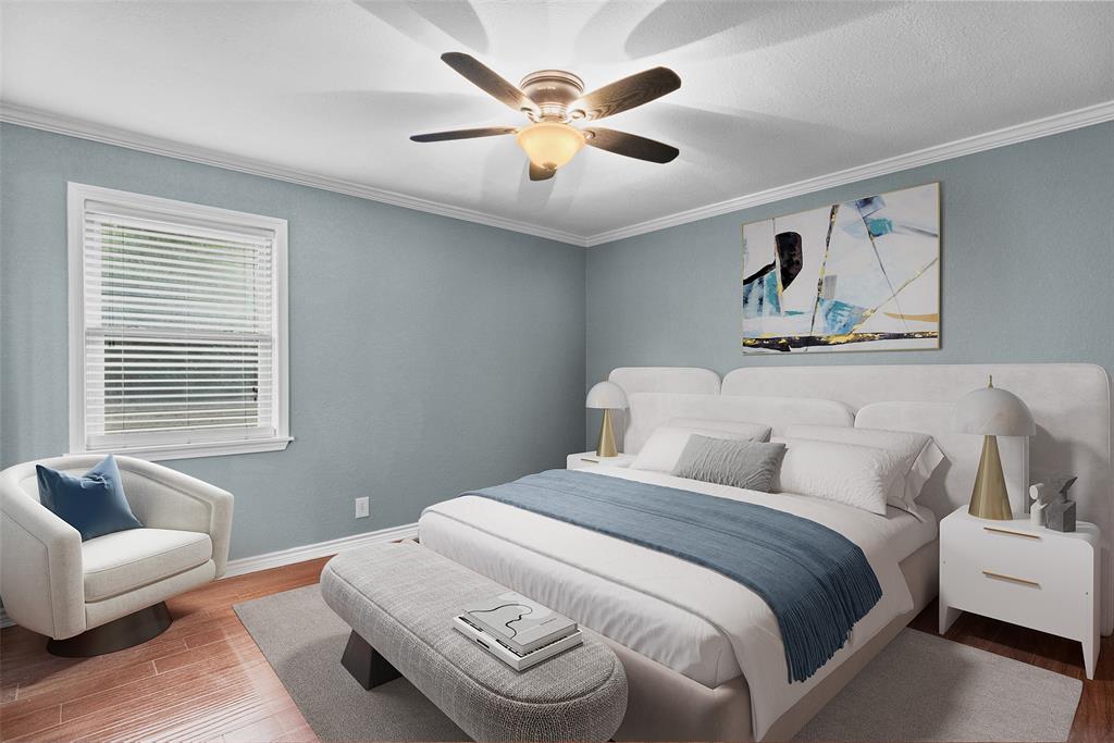 3217 Libbie Street Tyler, TX 75707 - Photo 15 of 35 a bedroom with bed and a couch