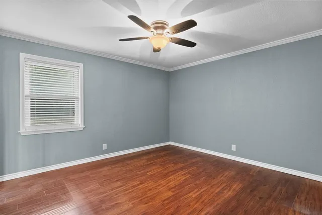 a bedroom with bed and a couch