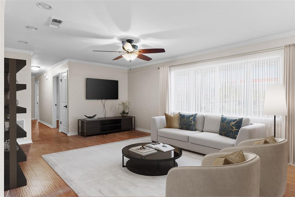 3217 Libbie Street Tyler, TX 75707 - Photo 4 of 35 a living room with furniture and a flat screen tv