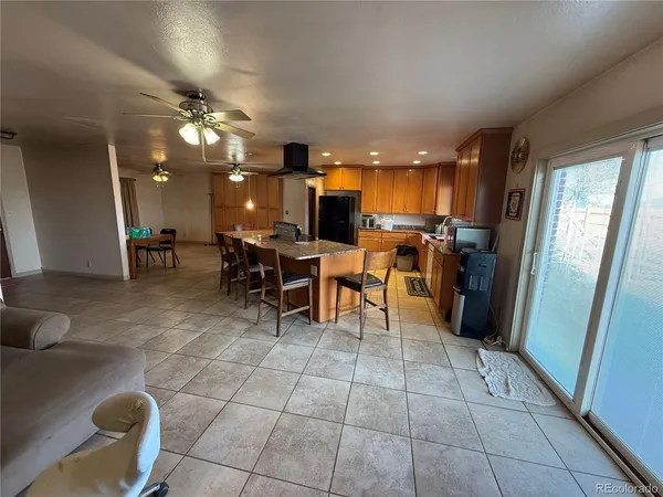 a view of a dining room kitchen and a window