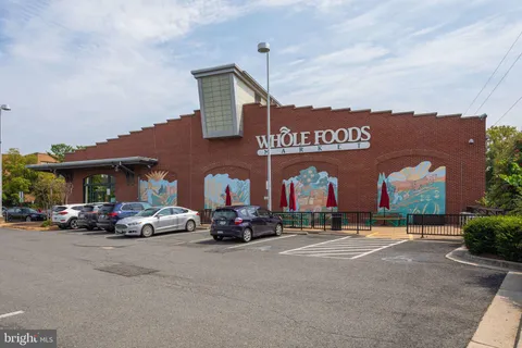 a view of a car parked in front of a building