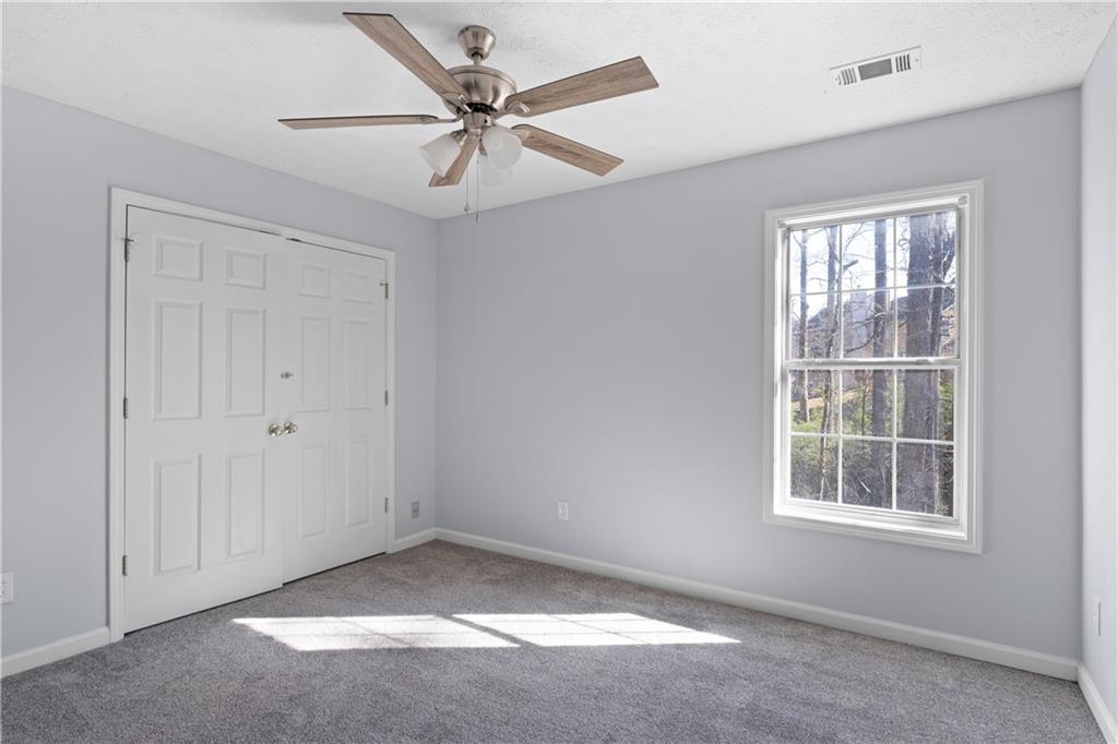 4240 Berkeley Mill Lane Duluth, GA 30096 - Photo 22 of 32 a view of an empty room with a window